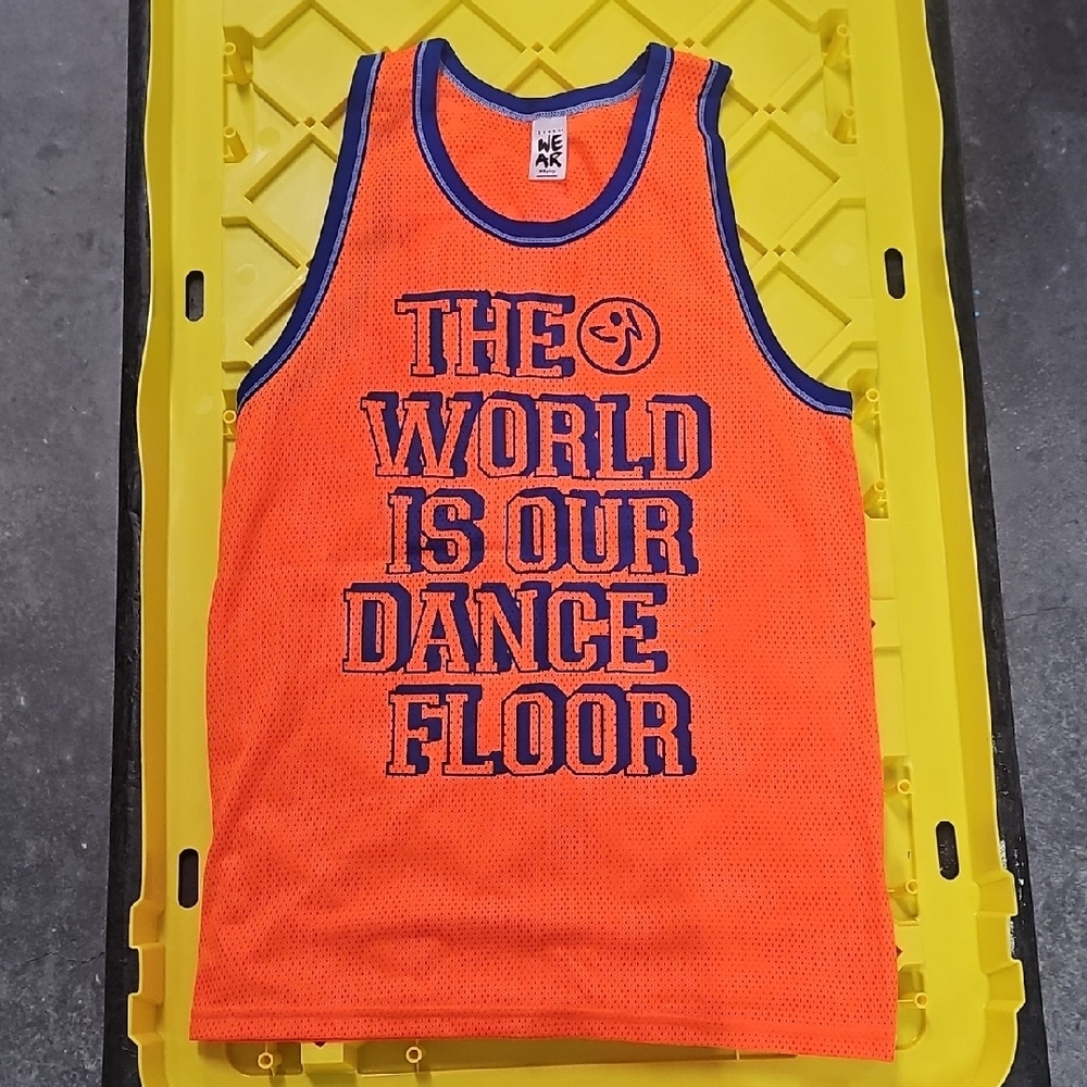 Gently Used Zumba Fitness "World Is Our Dance Floor Jersey Size XS